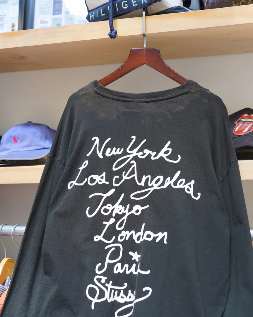 VINTAGE STUSSY WORLD TOUR CITIES SCRIPT LOGO FADED BLACK TEE hover